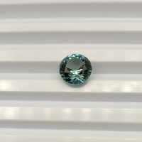 Топаз голубой c зеленоватым оттенком, круг 12 мм